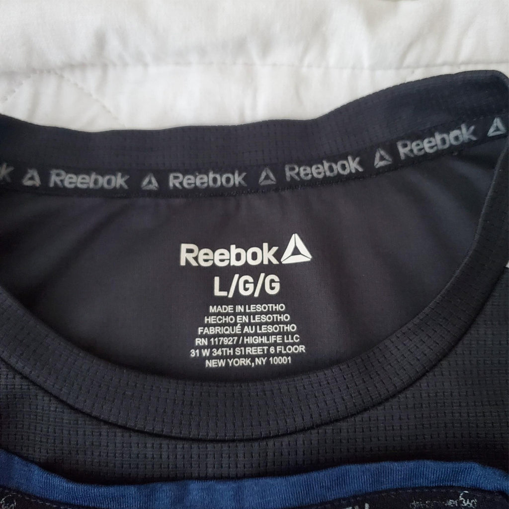 Lot of 4 Size L Rebook, Russell & Other Brand  Dry Fit Short Sleeve Shirt Mens 