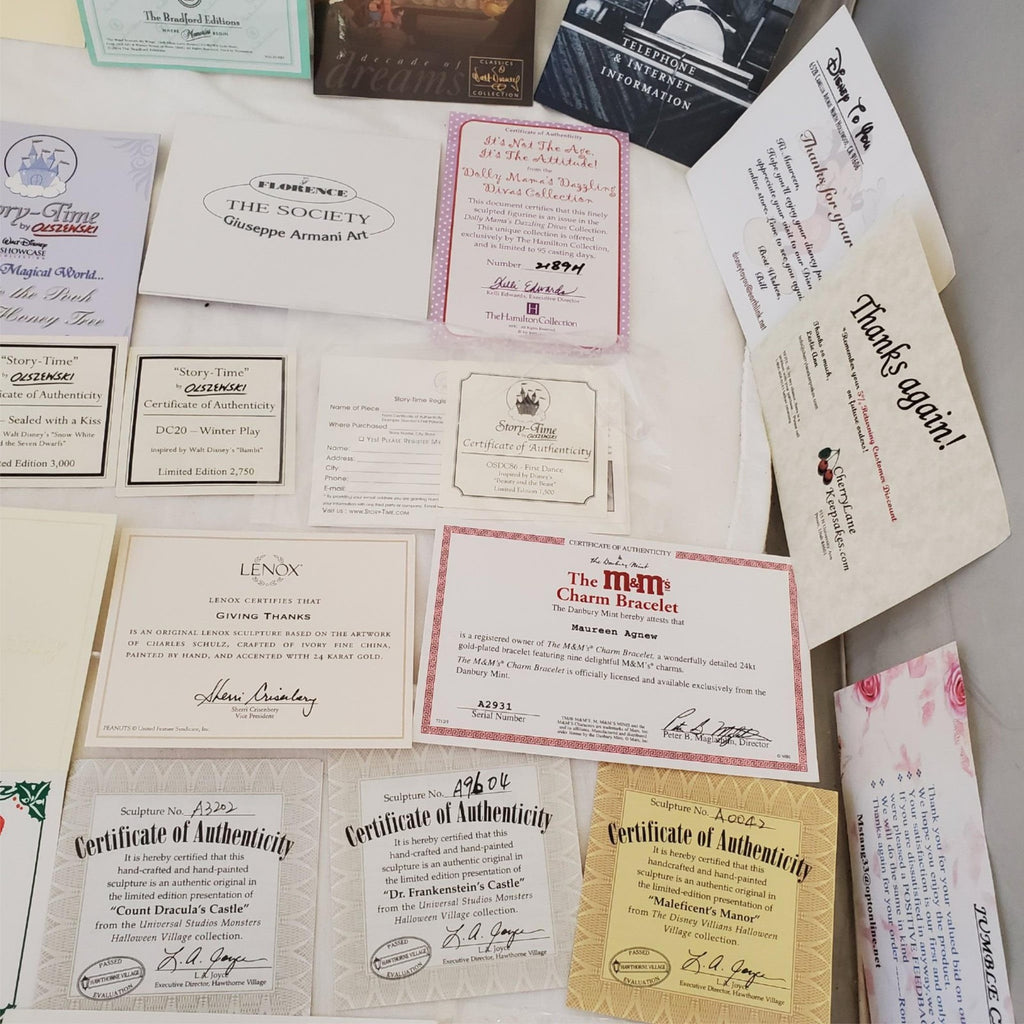 Large Lot of Disney Peanuts Certificate of Authenticity COA Paperwork