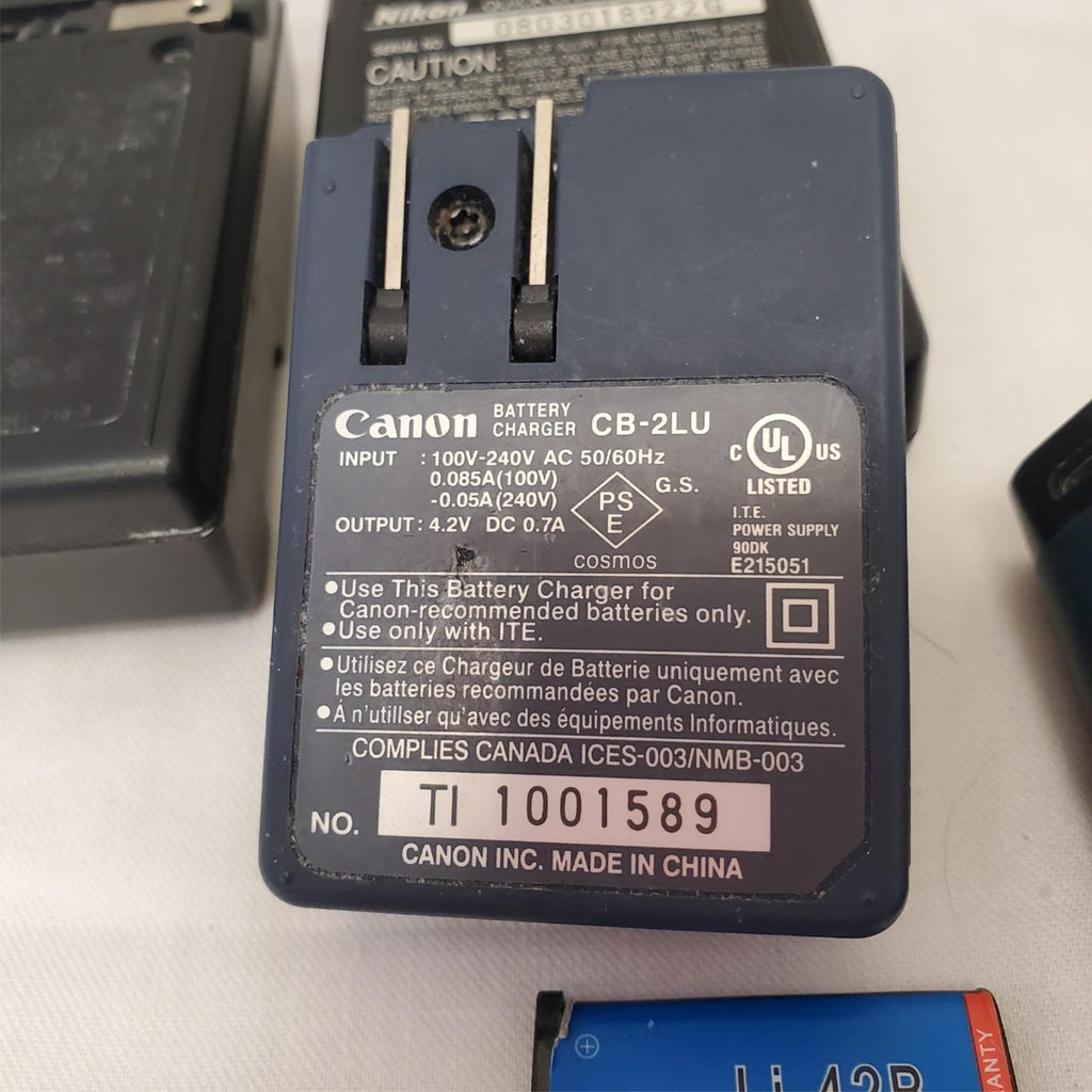 Lot of FujiFilm FinePix T555 Digital Camera & Various Batteries & Chargers