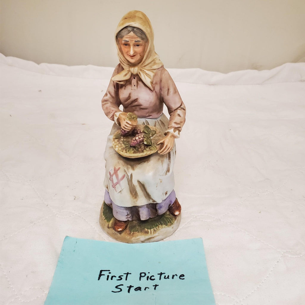 Old lady Holding Basket of Grapes Ceramic Porcelain Figurine
