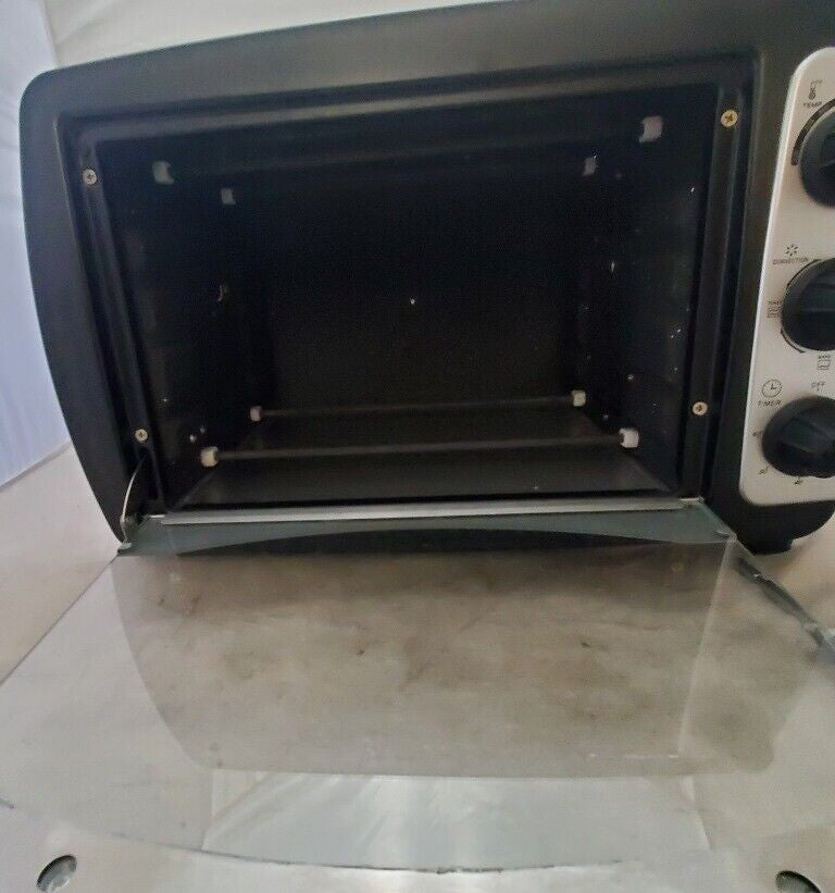 Emerson TOR23 Owners Manual 0.8 Cubic FT. Convection Toaster Oven