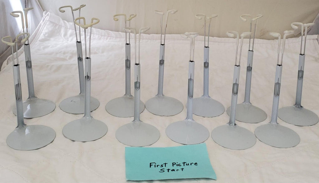 Lot of 13 Assorted White Adjustable Doll Stands