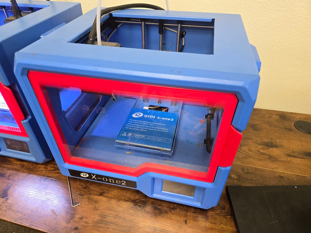 Working QIDI X‑One2 3D printer