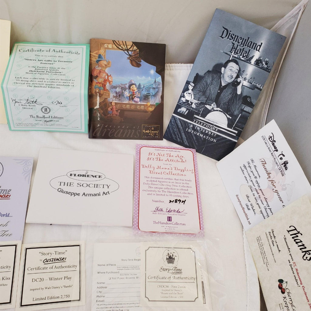 Large Lot of Disney Peanuts Certificate of Authenticity COA Paperwork