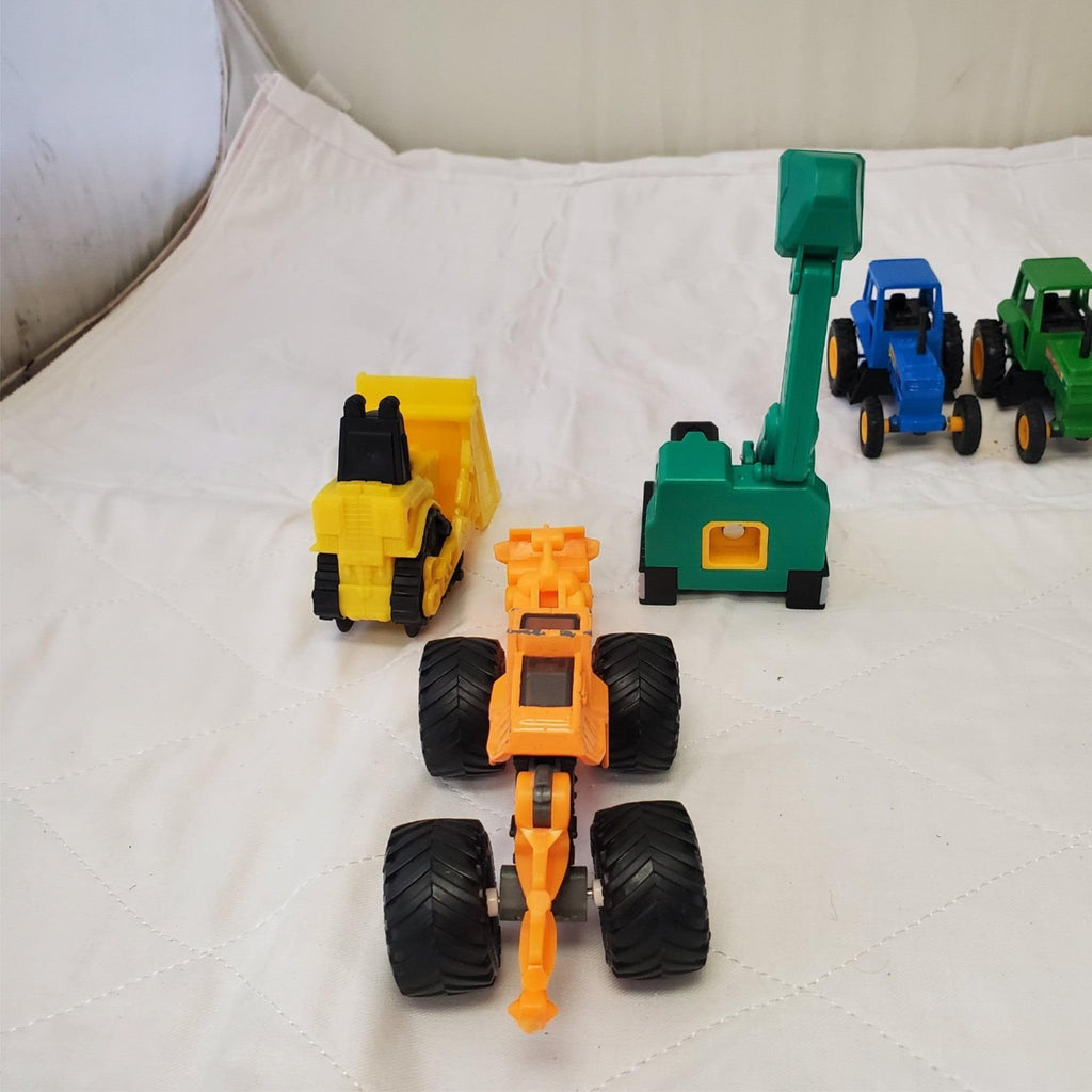 Lot of Assorted Monster Jam Dugg Dirt Squad Monster Truck Toys