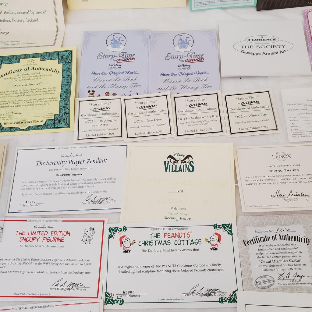 Large Lot of Disney Peanuts Certificate of Authenticity COA Paperwork