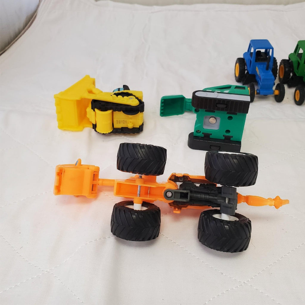 Lot of Assorted Monster Jam Dugg Dirt Squad Monster Truck Toys