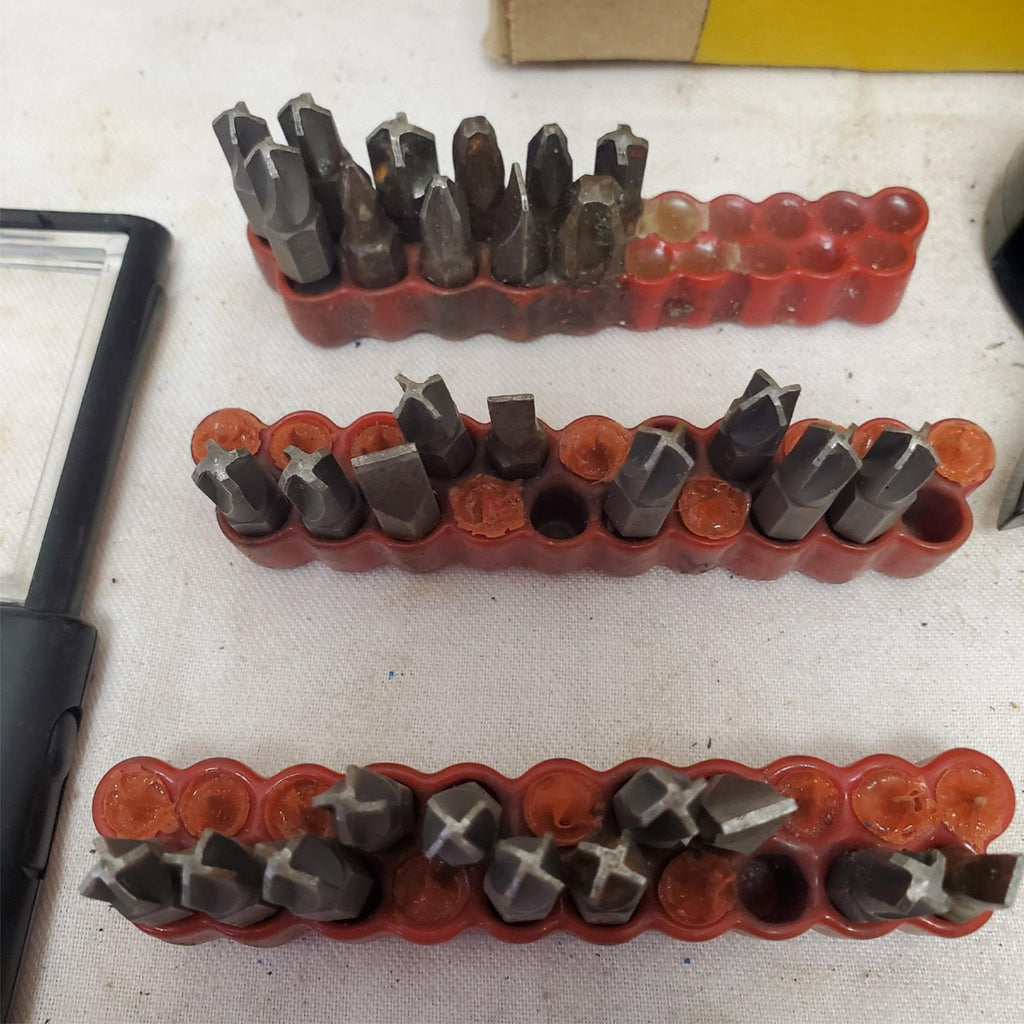 Lot of Screwdriver Bits and Magnifying Tools