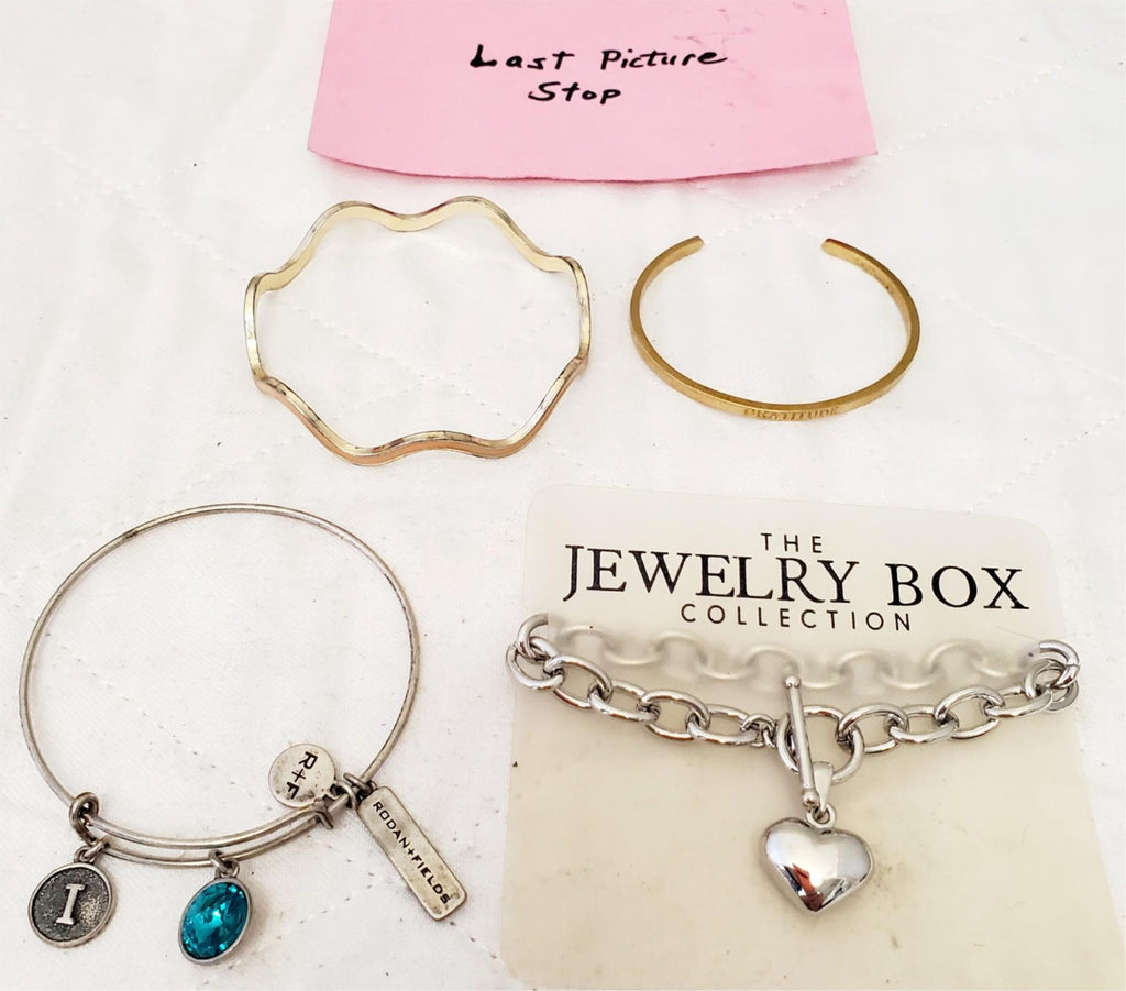 Lot of 4 Rodan Fields & Others Brands Bangle Bracelets