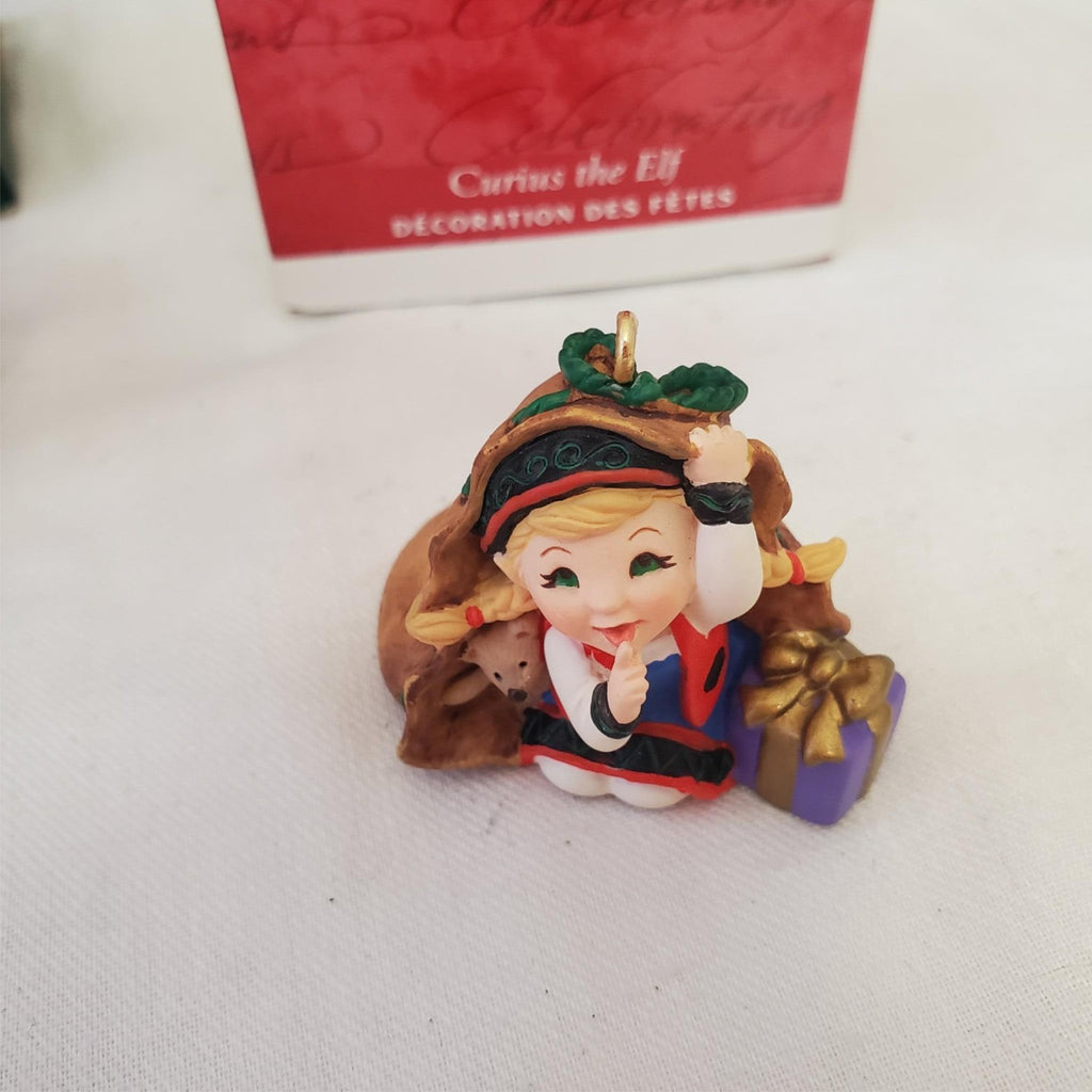 Hallmark Keepsake Ornament Cheerful Santa & Curious The Elf
