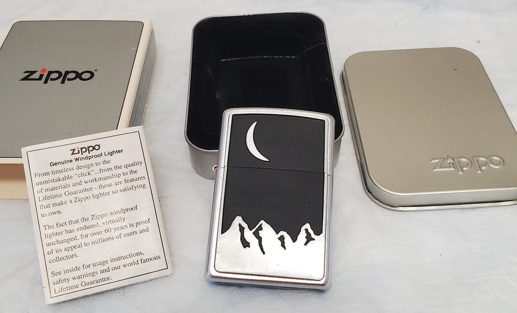 Vintage 1999 Bradford, PA Made in USA Zippo Lighter Moon Over Mountains Logo
