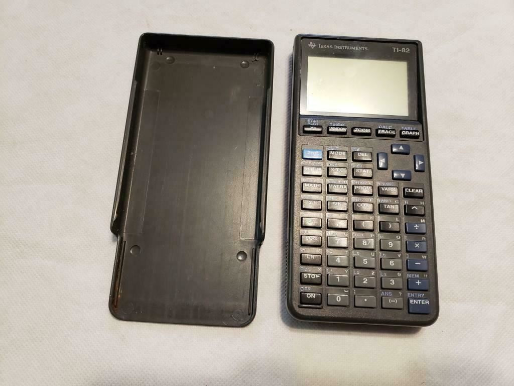 Texas Instruments TI-82 Graphing Calculator w/Cover & Owner Manual Working