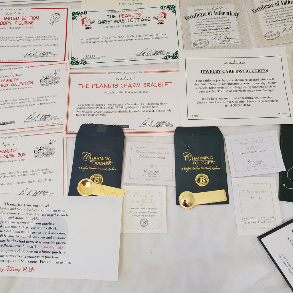 Large Lot of Disney Peanuts Certificate of Authenticity COA Paperwork
