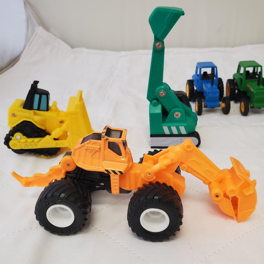 Lot of Assorted Monster Jam Dugg Dirt Squad Monster Truck Toys