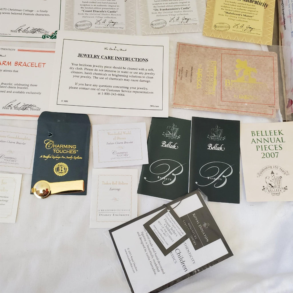 Large Lot of Disney Peanuts Certificate of Authenticity COA Paperwork