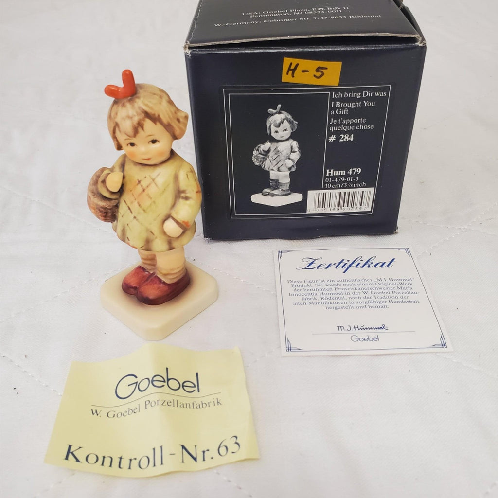 Goebel Hummel Figurine "I Brought You A Gift"  HUM 479 H-5