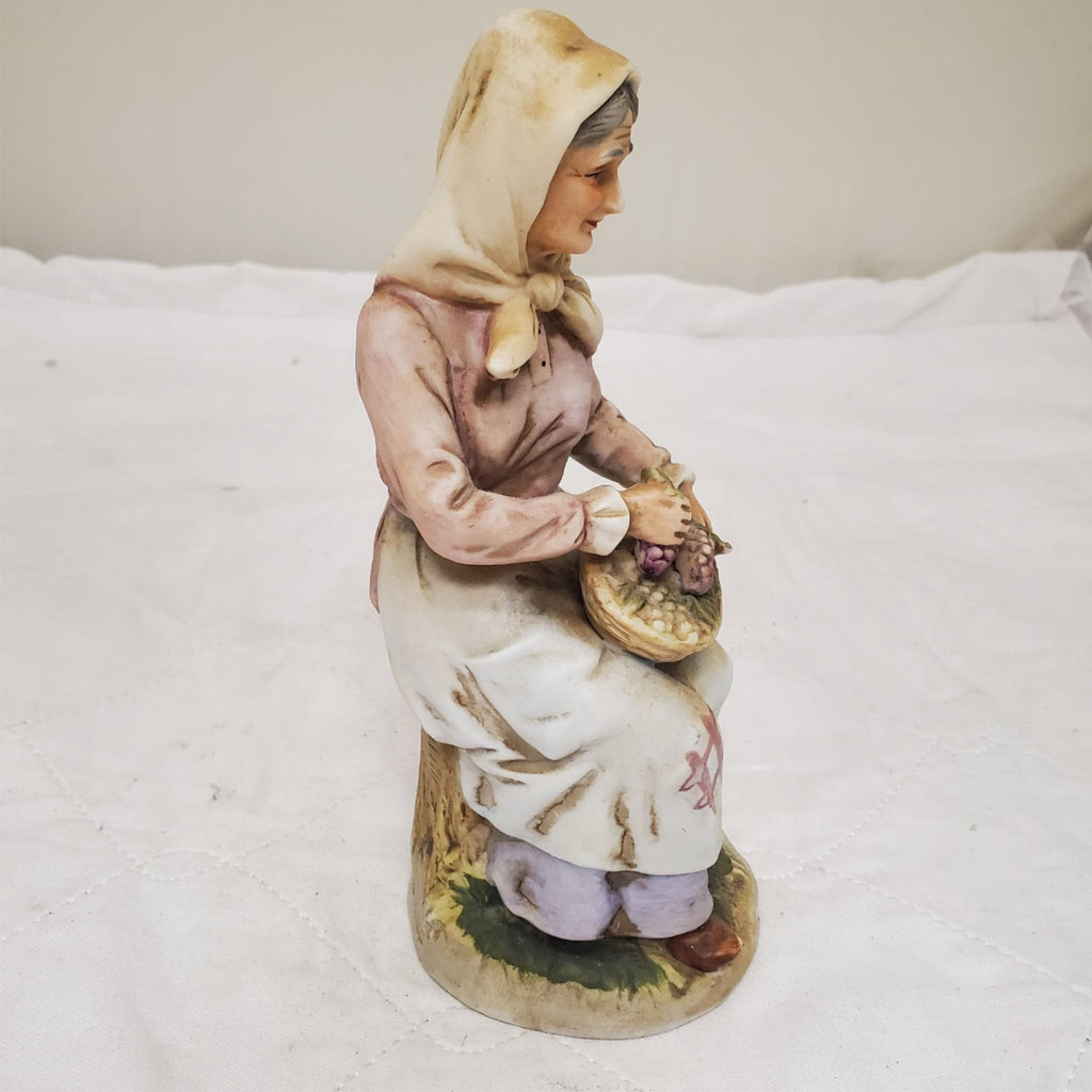 Old lady Holding Basket of Grapes Ceramic Porcelain Figurine