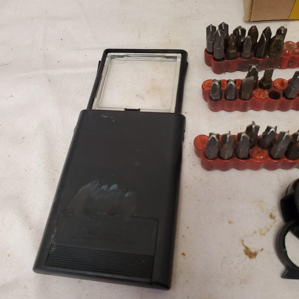 Lot of Screwdriver Bits and Magnifying Tools