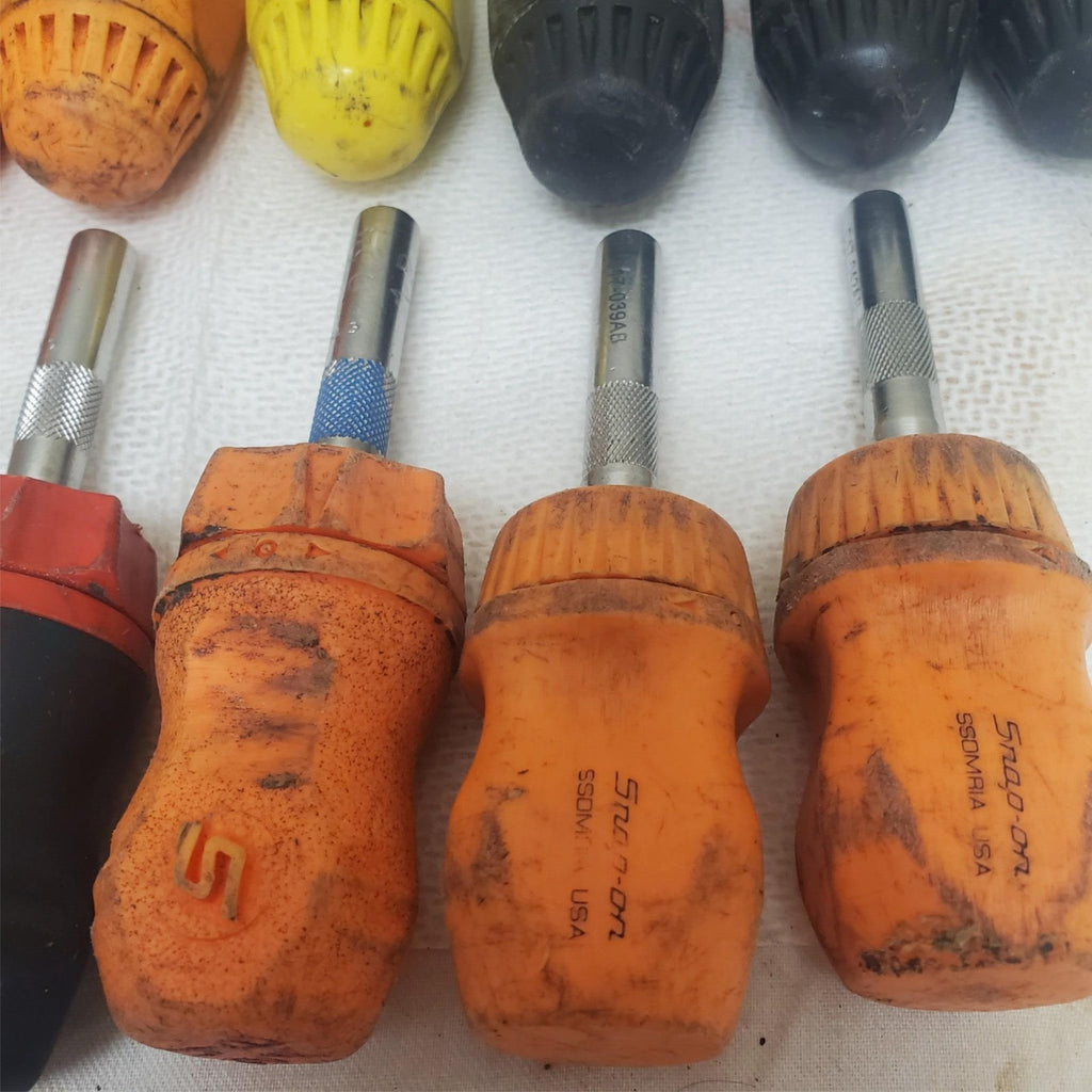 Lot of 19 Snap on screwdrivers of colors black, red, orange, and yellow LOT-1059