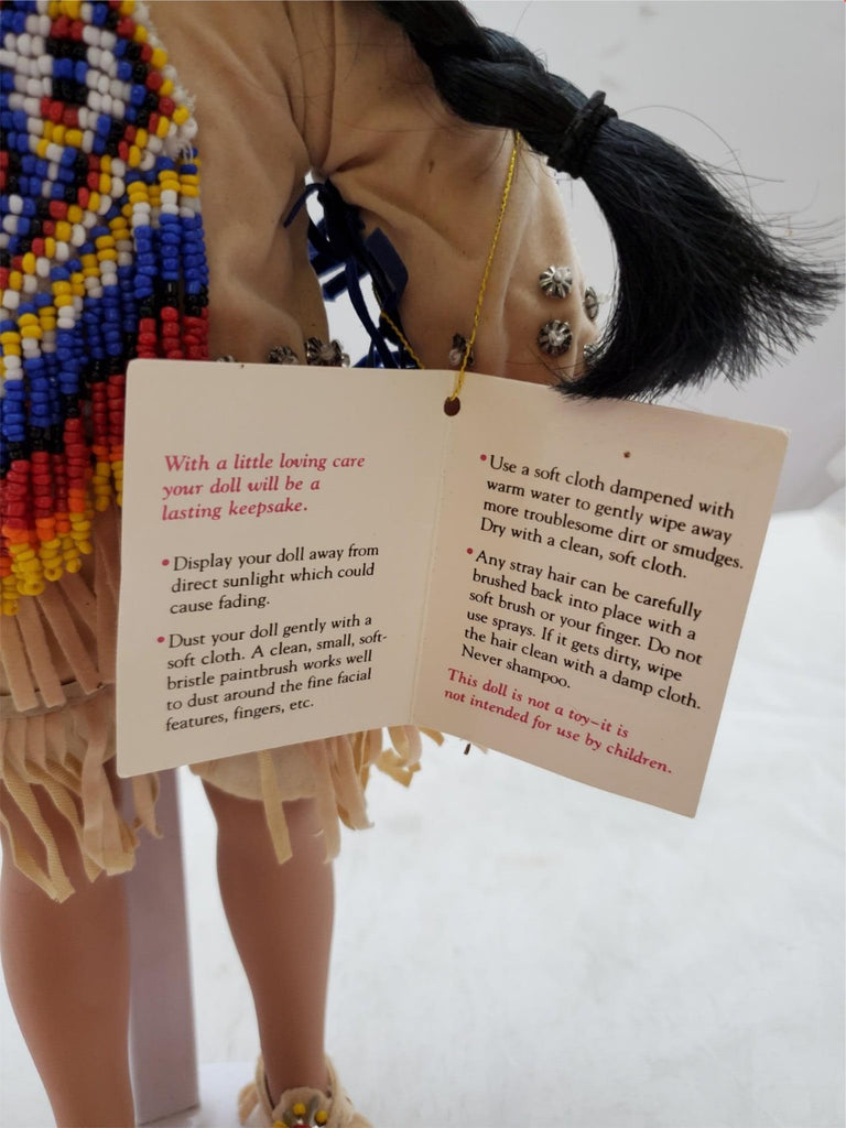 Paradise Galleries Purveyor of the World Finest Porcelain Dolls with Doll Stand