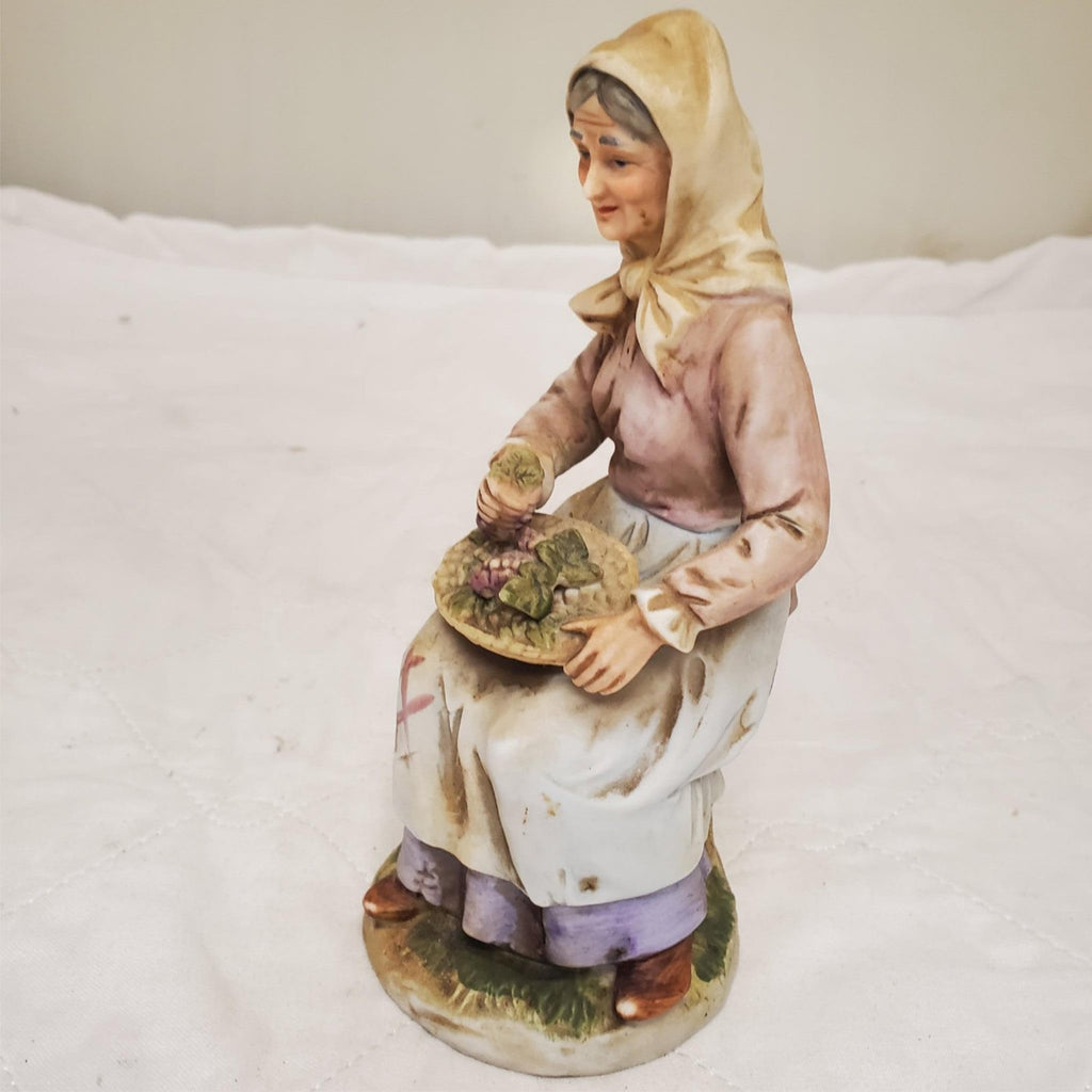 Old lady Holding Basket of Grapes Ceramic Porcelain Figurine