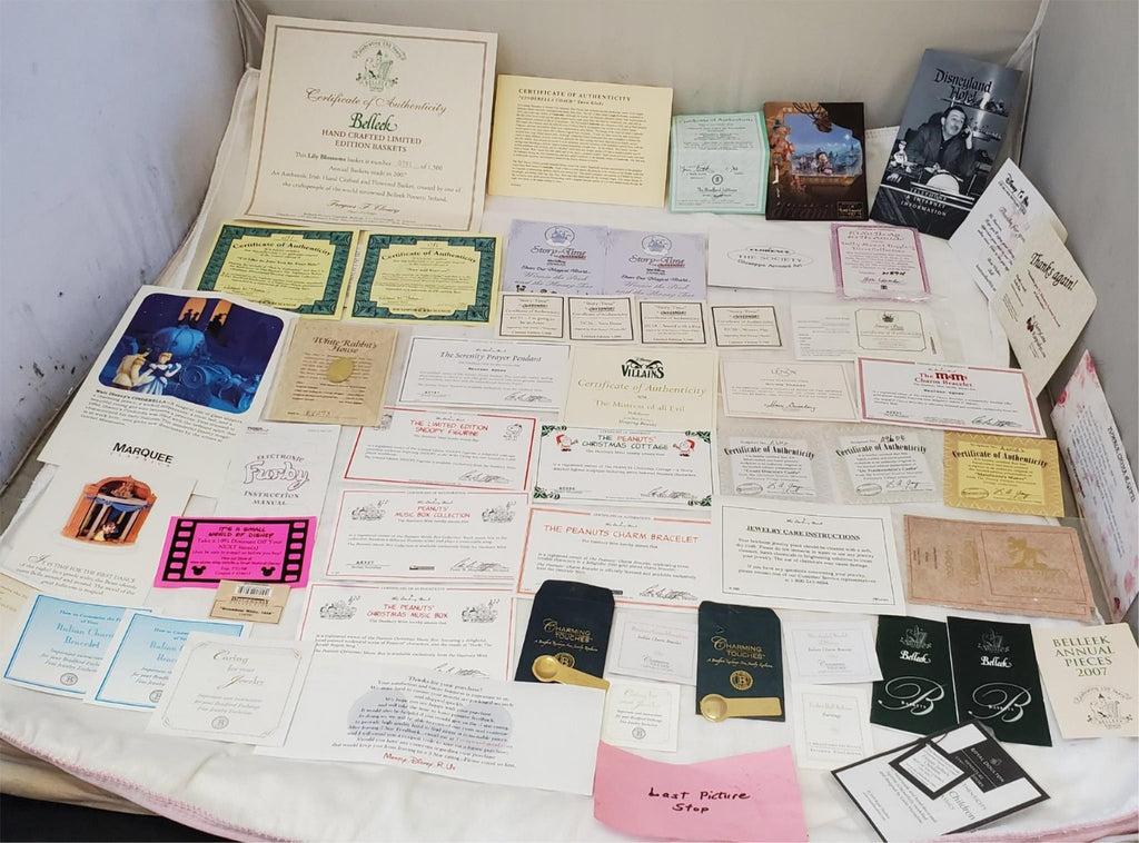 Large Lot of Disney Peanuts Certificate of Authenticity COA Paperwork