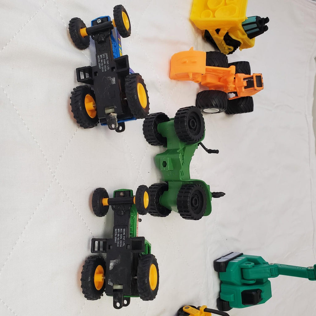 Lot of Assorted Monster Jam Dugg Dirt Squad Monster Truck Toys