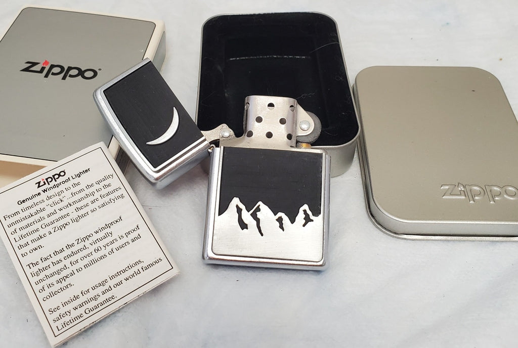 Vintage 1999 Bradford, PA Made in USA Zippo Lighter Moon Over Mountains Logo