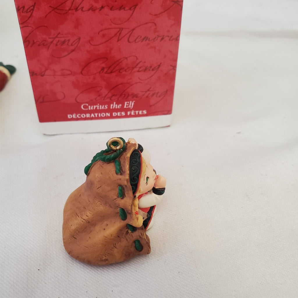 Hallmark Keepsake Ornament Cheerful Santa & Curious The Elf