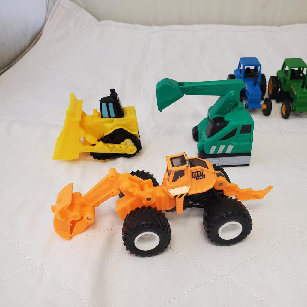 Lot of Assorted Monster Jam Dugg Dirt Squad Monster Truck Toys