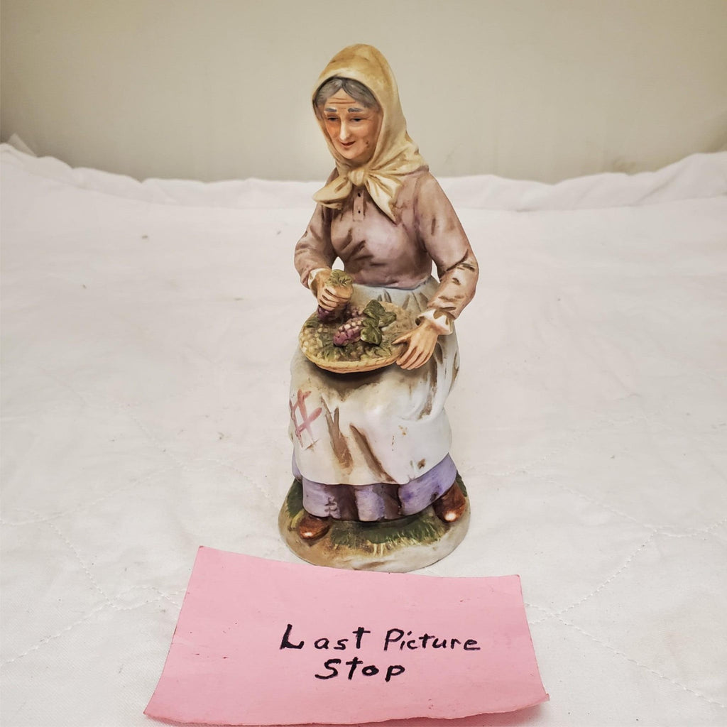 Old lady Holding Basket of Grapes Ceramic Porcelain Figurine